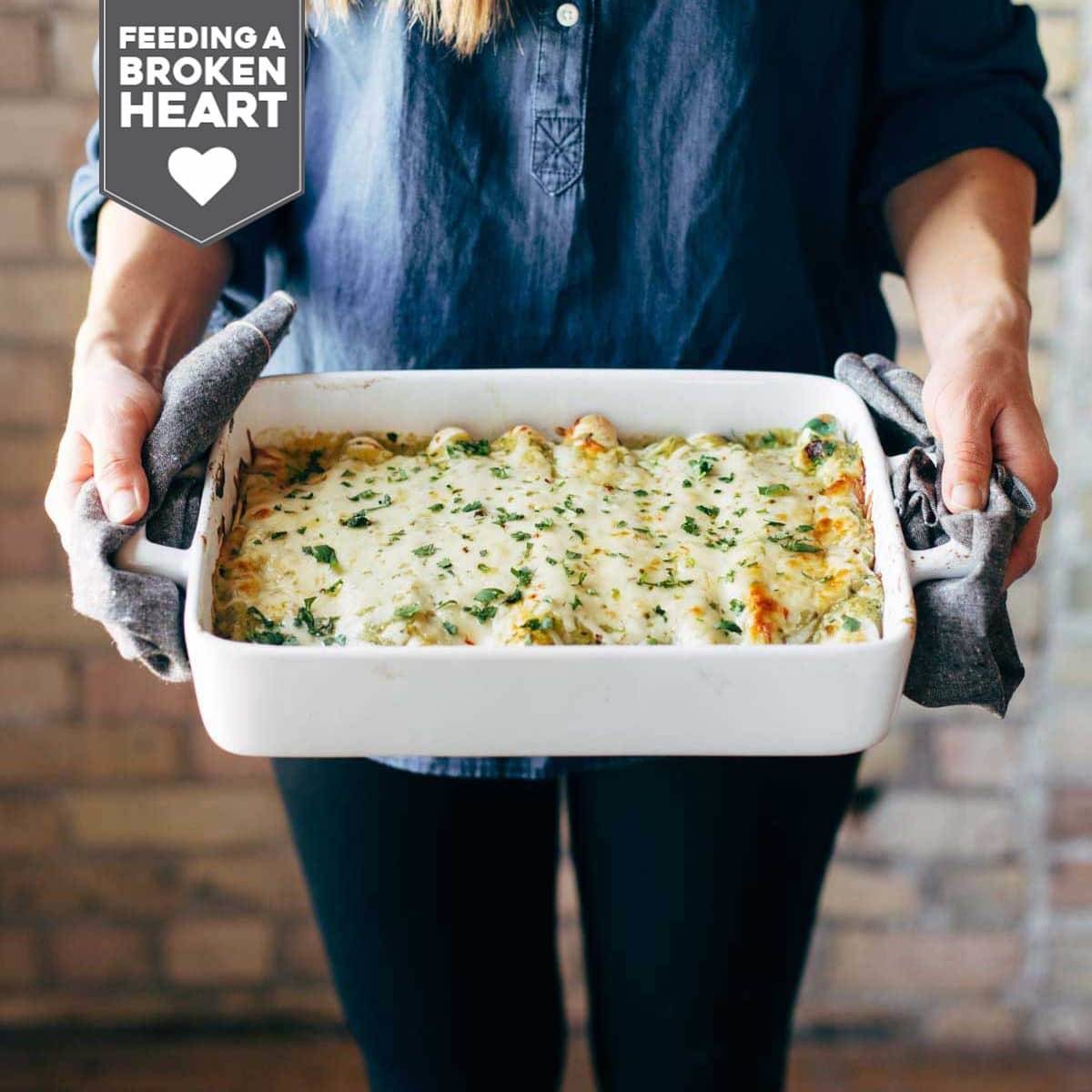 Enchiladas verdes in a pan.