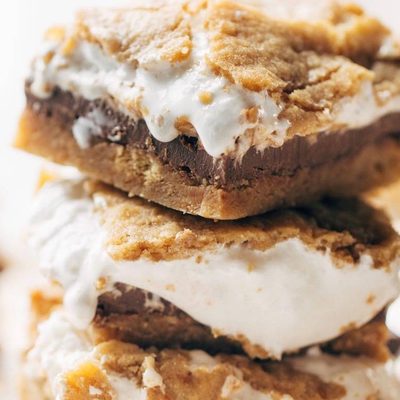 S'Mores Bars in stack with melted marshmallows.