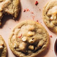 Strawberry white chocolate cookies on a pink background