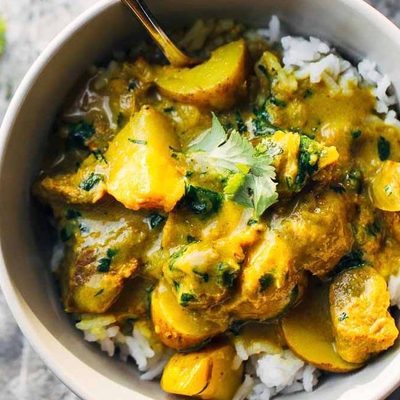 Thai Yellow Curry with Beef and Potatoes in bowls.
