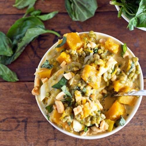 Thai basil coconut lentils in a bowl with a spoon.