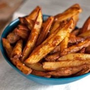 A picture of Baked Spicy Fries with Garlic Cheese Sauce