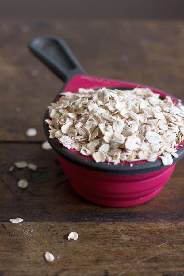 Oats in a measuring cup.