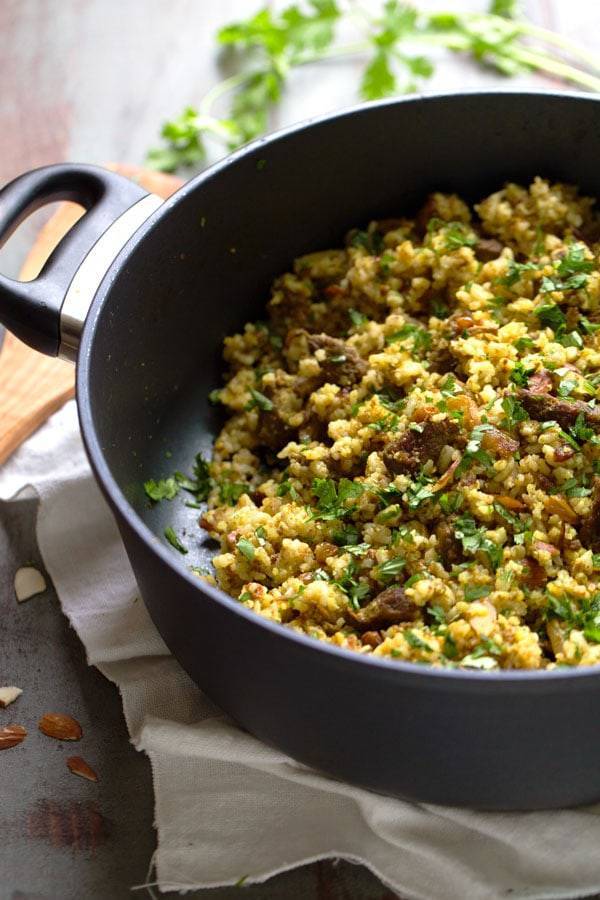 Beef Biryani in a black skillet.