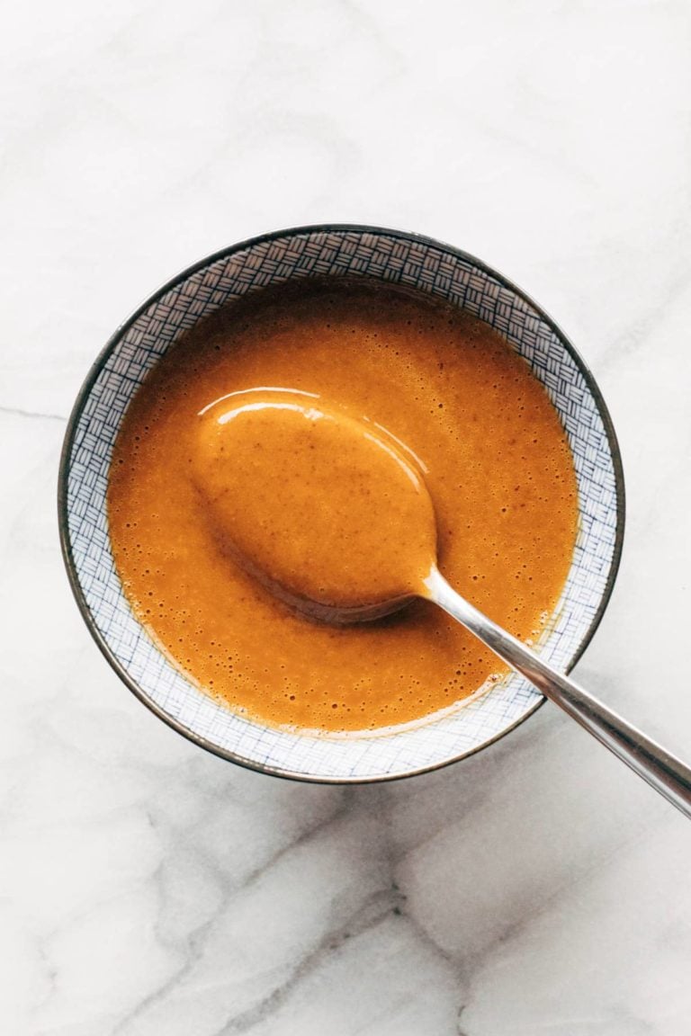 Peanut sauce in a bowl with spoon.