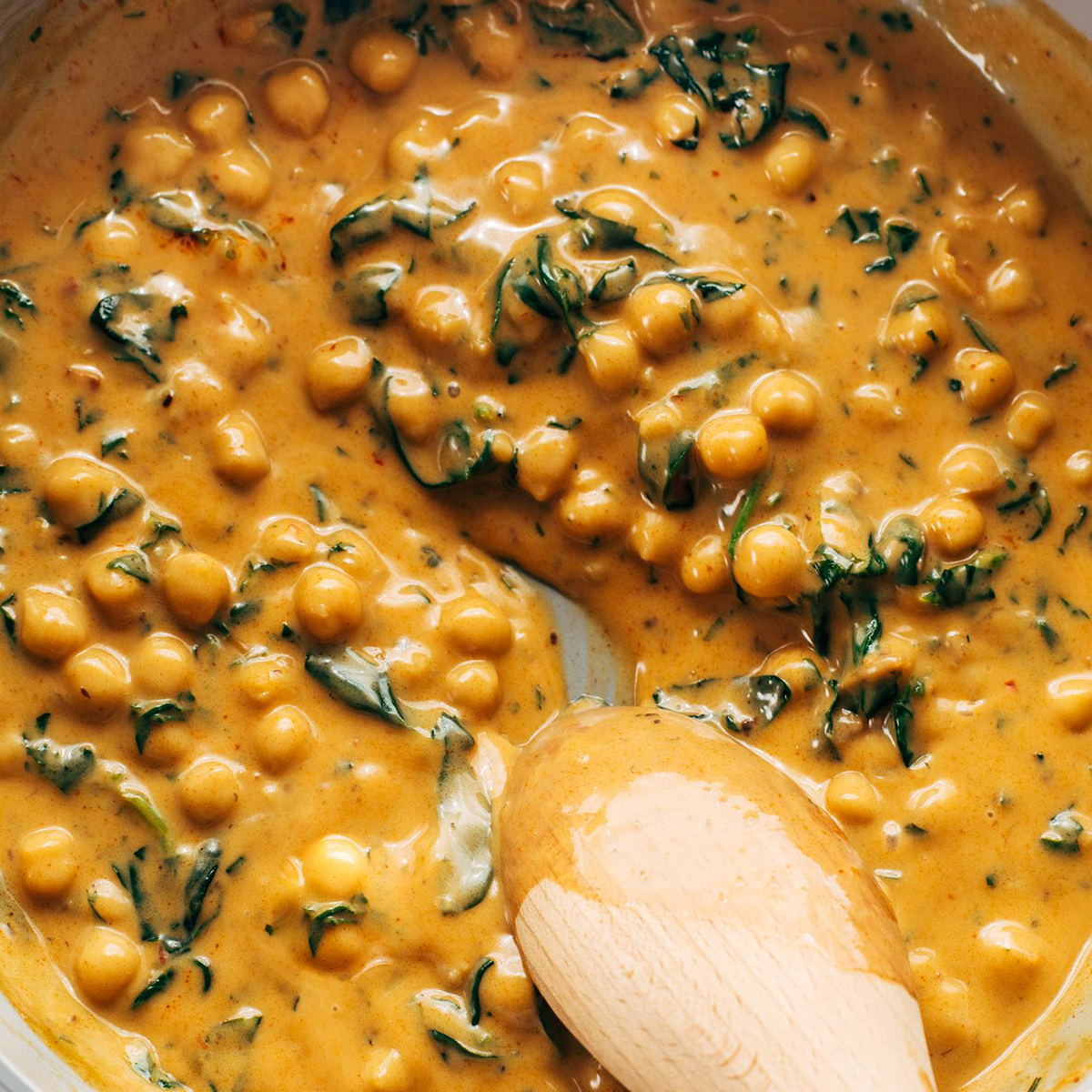 Chickpea curry in a skillet.