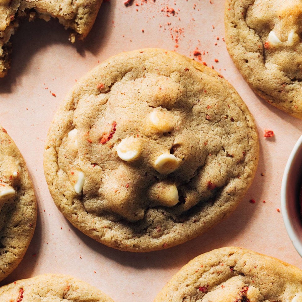 Strawberry white chocolate cookies on a sheet pan